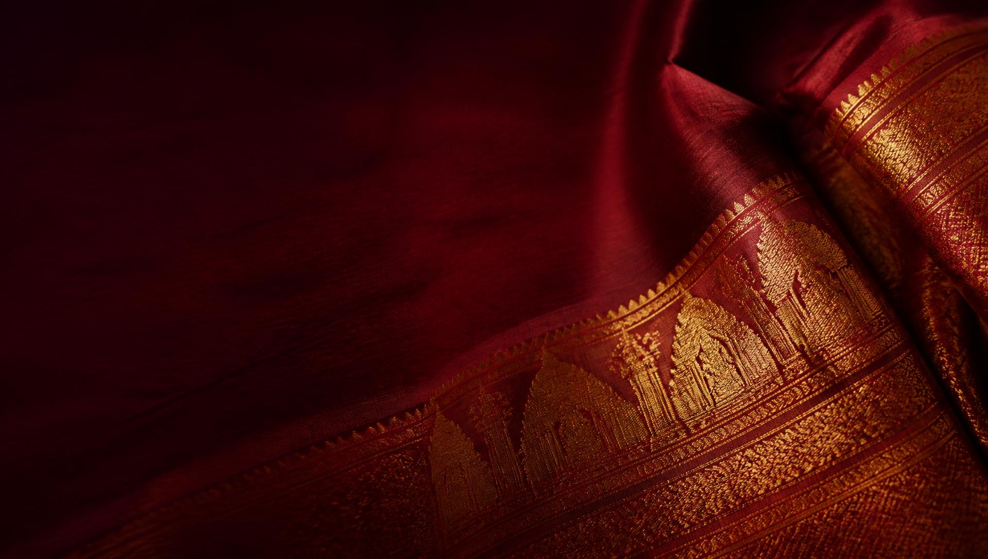 Close-up of gold zari weaving on a Silk Mark certified pure soft silk saree pallu